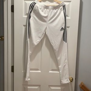 Adidas track pants.